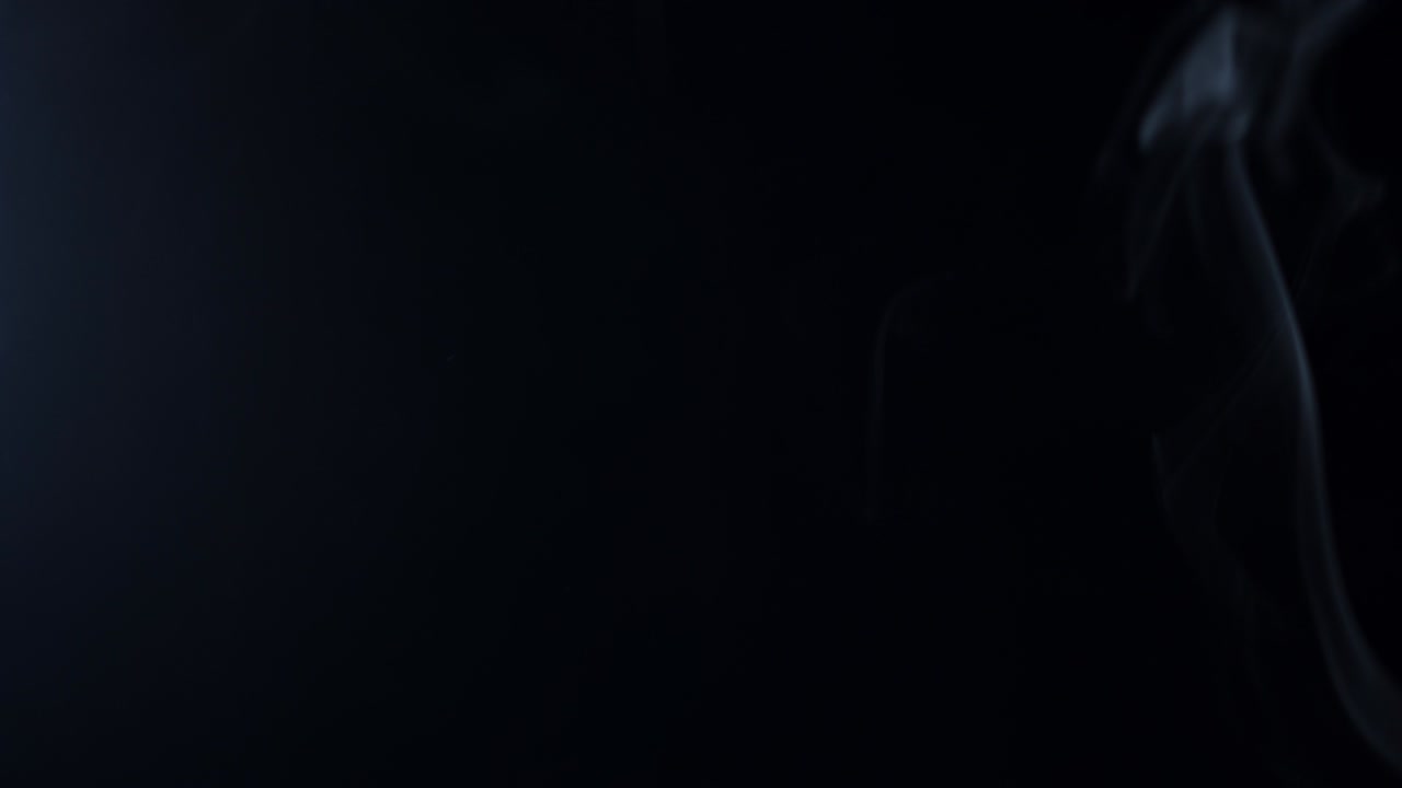 fondo negro de 4k de partículas, polvo y humo en movimiento