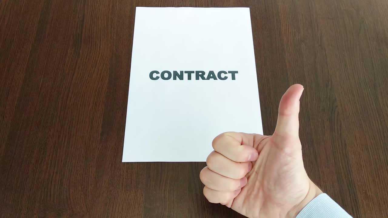 Contract sign on a white paper