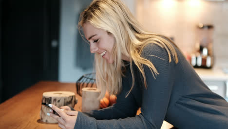 Woman-using-mobile-phone-at-home-4k