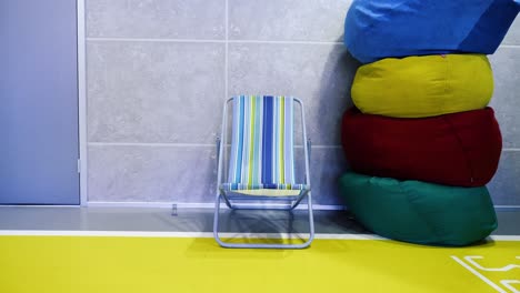 modern lounge area with beach chair and bean bags