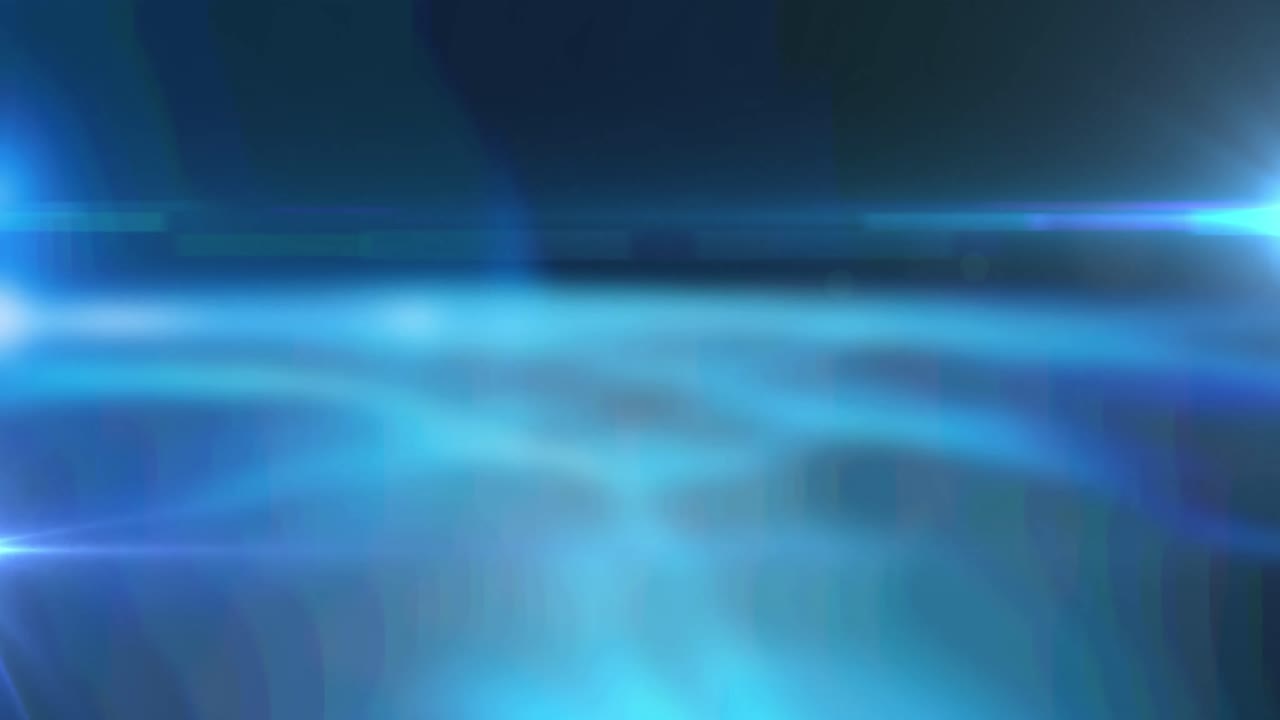 Animation of glowing spot with light trails on blue background