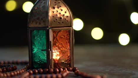 arabic lantern and tasbih (prayer beads beads)