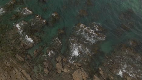 4K-turning-birds-eye-on-rocky-coastline