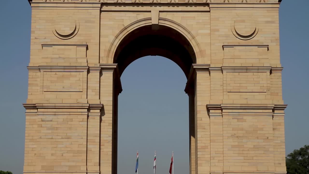 Tilting up shot of India Gate, New Delhi, India