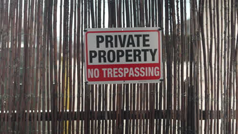 private property sign on a wooden fence