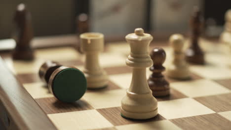 chess game, white queen winning over the black king