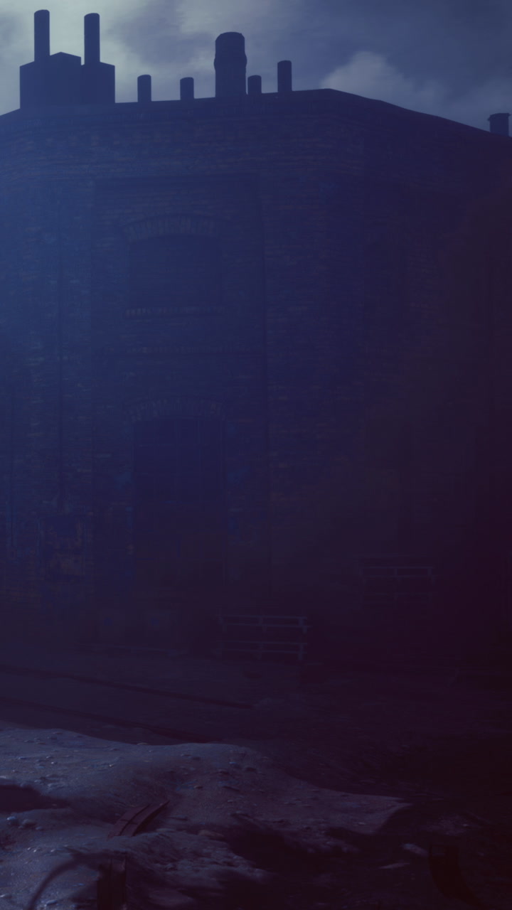 Light shining through a dark urban area at nighttime near buildings