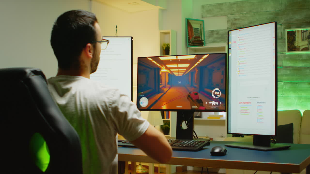 헤드폰을 들고 슈팅 게임을 하는 남자 의 뒷면