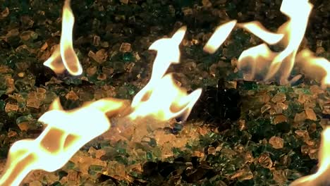 flames flickering on fire pit, slow motion closeup