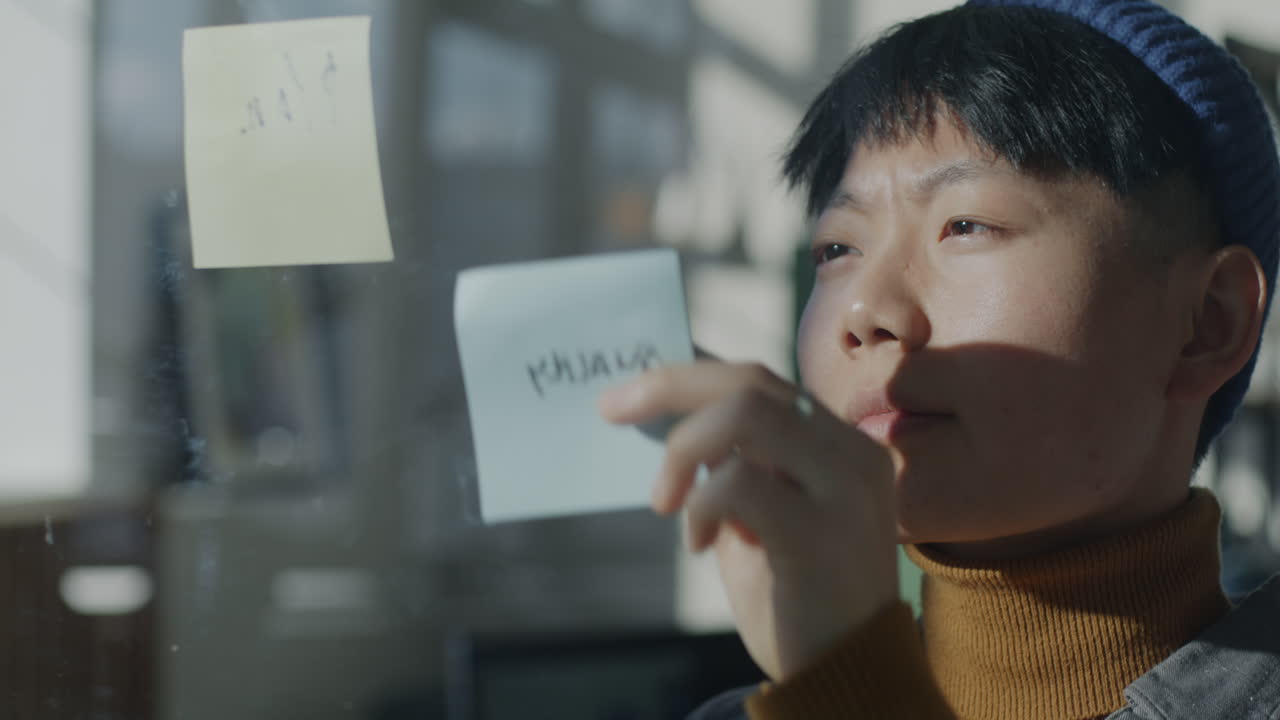 Young woman brainstorming at work