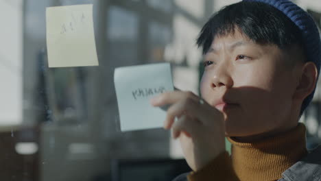 young woman brainstorming at work