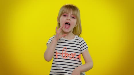 Little-blonde-teen-kid-child-girl-in-t-shirt-shouting-hello,-waving-hand,-welcoming-with-hi-gesture