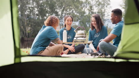 Tent,-tea-and-a-camp-volunteer-group-talking