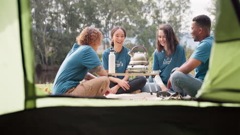 tent, tea and a camp volunteer group talking