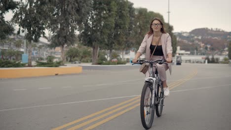 woman riding a bike in the city