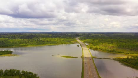 bridging wilderness and civilization: cariboo highway near 100 mile house