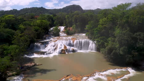 wide revealing drone shot of the cascadas de agua azul and the waterfalls found on the xanil river in chiapas mexico