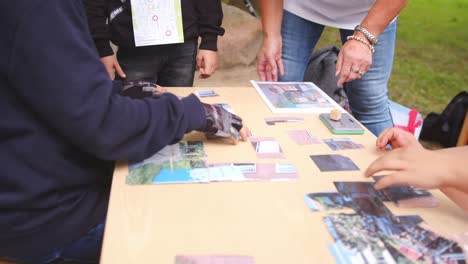 child with gloves doing the puzzles