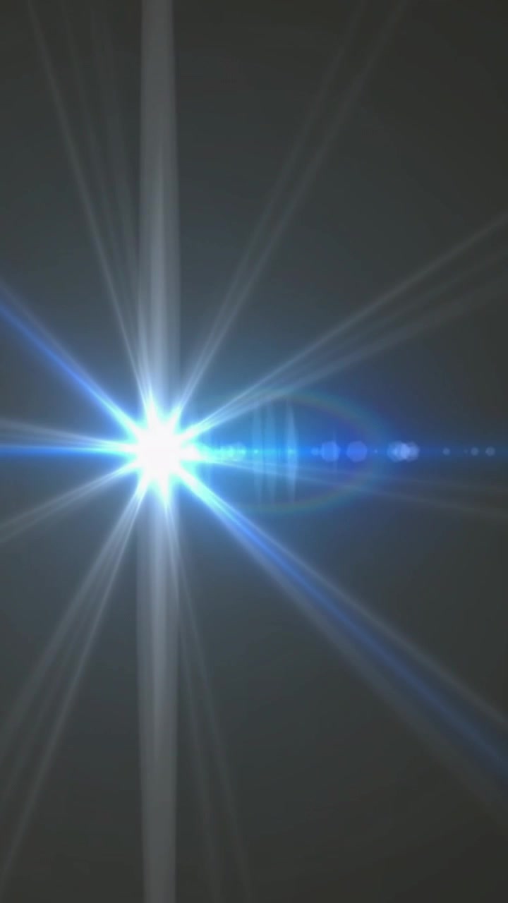 Video verticale: Bagliore dell'obiettivo che inizia a sinistra con un effetto a stella, anelli crescenti, immagini fantasma che si spostano, che svanisce per una demo