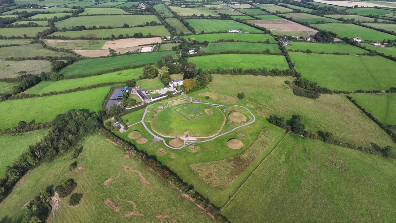 Knowth prehistoric tomb on hill, drone reveal historical site and Irish landscape