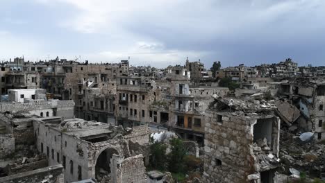 the historic city centre of aleppo in syria. we still can see buildings destroyed even 10 years after the war - aerial view with a drone 4k