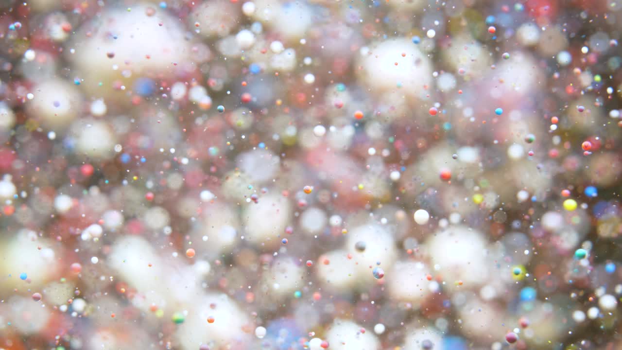 movimiento lento colores brillantes burbujas de aceite hermosa pintura color del universo movimiento de primer plano multicolor. pintura acrílica. superficie fantástica. abstracto pintura de colores estructura de metamorfosis burbujas coloridas