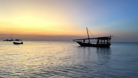 sunset over the indian ocean with dhows