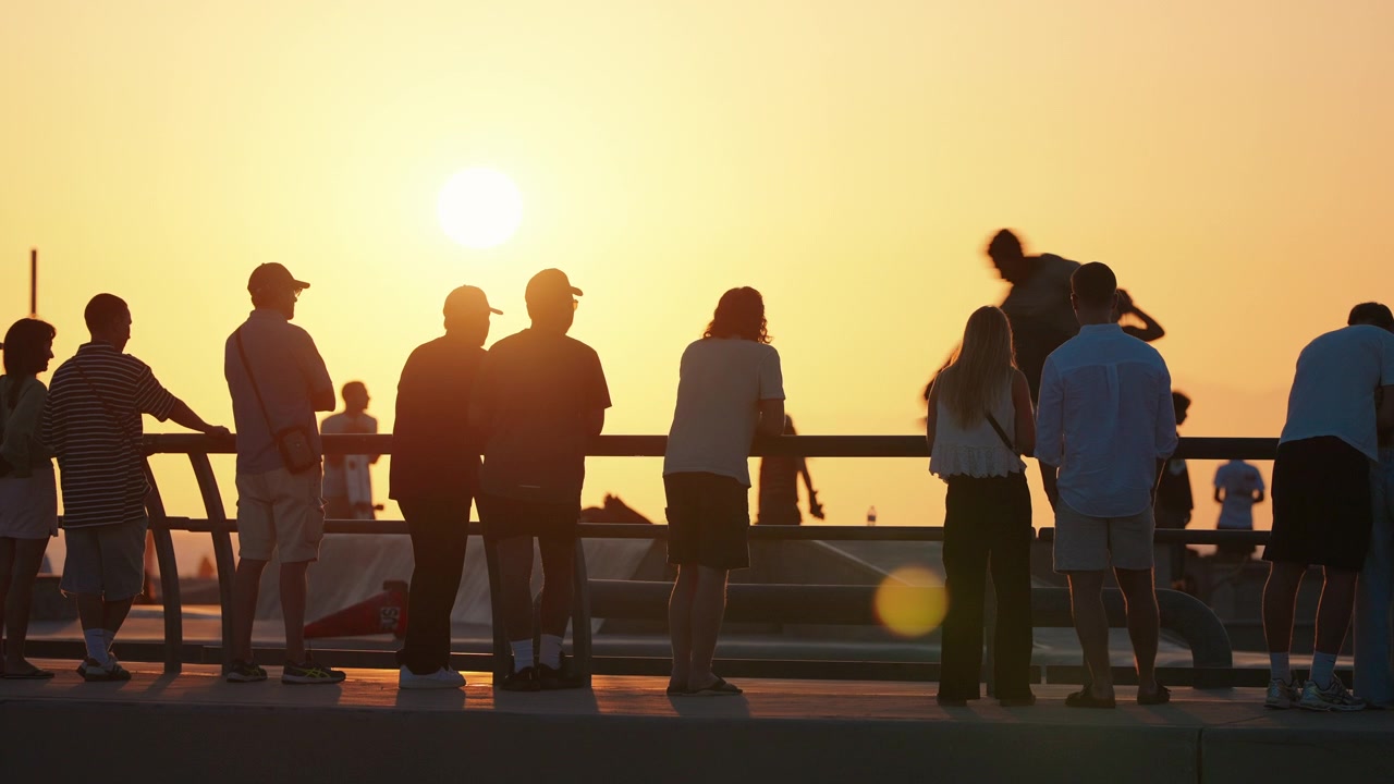 Sunset crowds gathered around the famous Venice Beach skate park