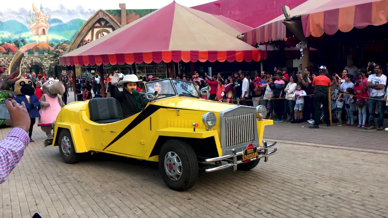 Evening Celebration at Adlabas Imagic Theme-Amusement Park with a rally and cartoon character costume in Maharashtra, India