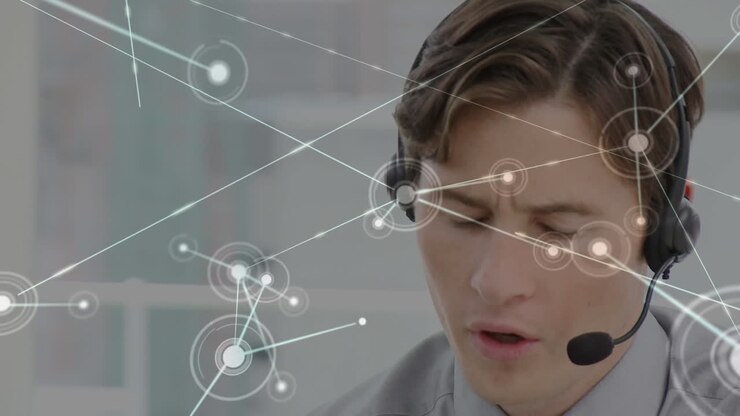 Animation of networks of connections over businessman using phone headsets