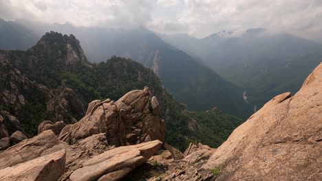 view from ulsanbawi rock course in seoraksan national park in south korea with low clouds