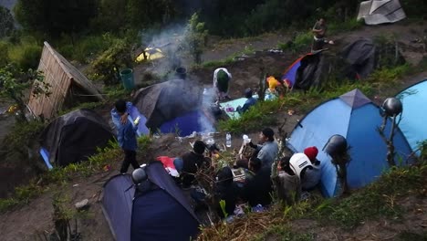 visitors who spend the night in a tent with the backdrop of mount batur in kintamani, bali, indonesia, november 13, 2020