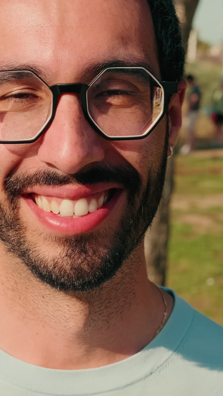 Happy Man Smiling at Picnic in the Park