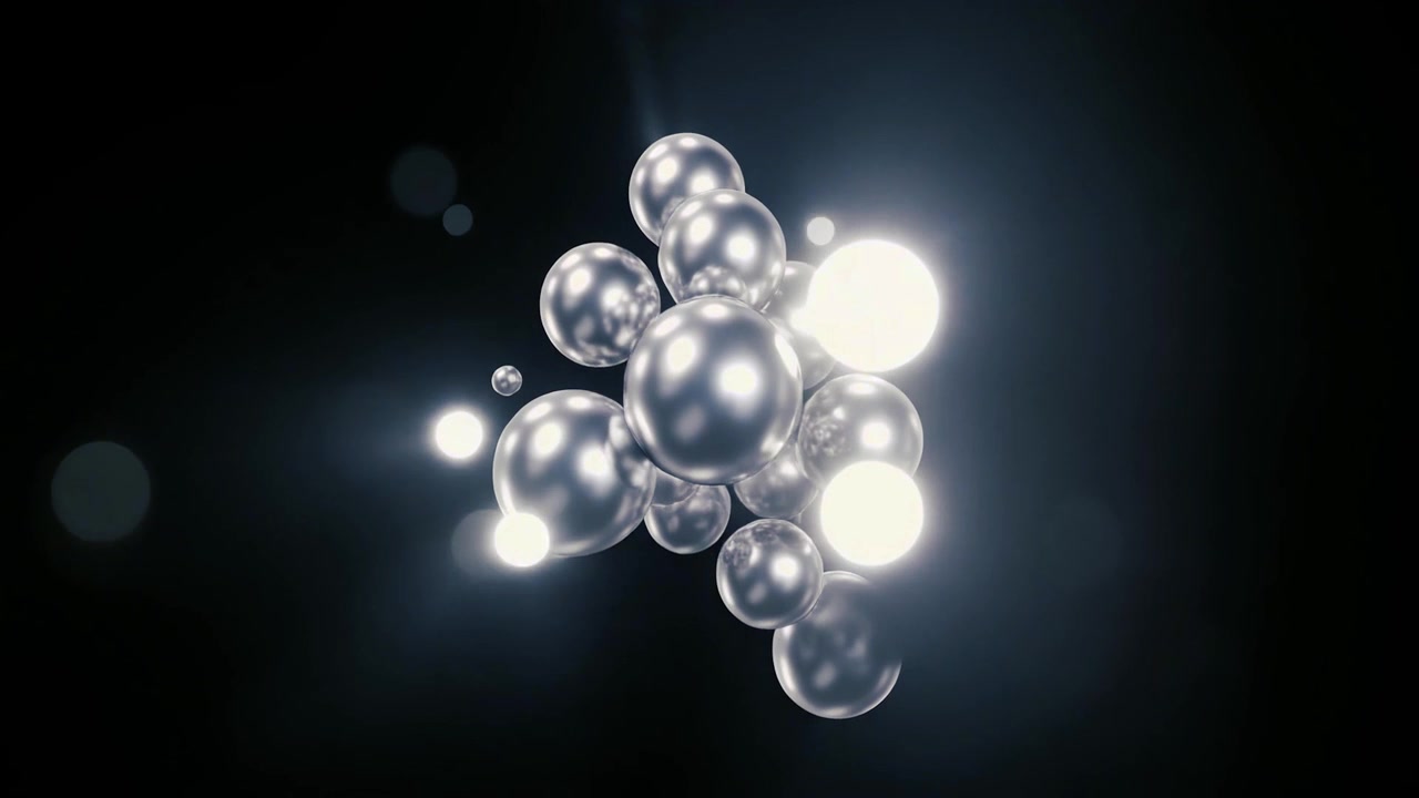 Grappolo astratto di sfere metalliche fluttuanti con riflessi di luce luminosi