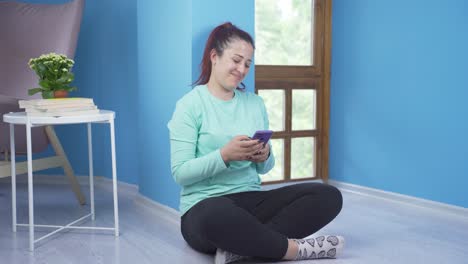 Woman-texting-with-happy-expression-with-her-boyfriend.