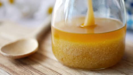 homemade ghee in container on a table