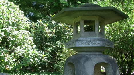 a large stone lantern in a japanese garden