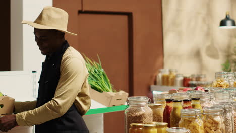 business owner restocking crates of fresh fruits and vegetables