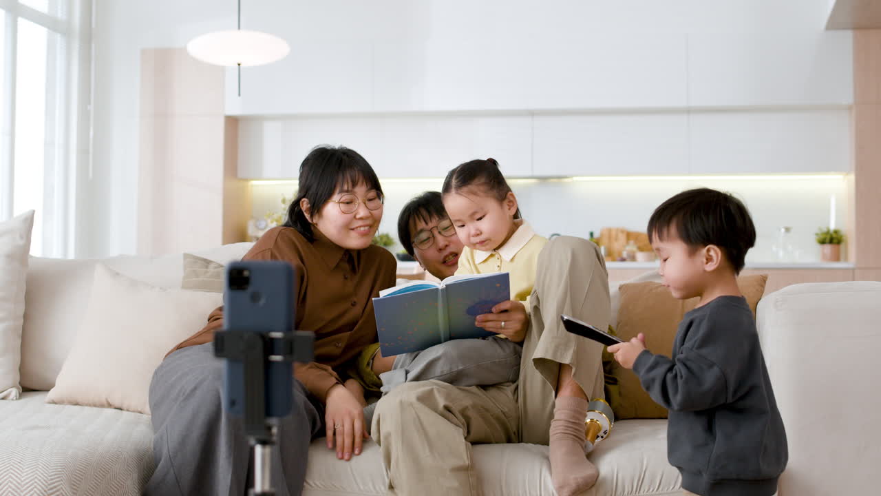 Family Reading Together on Video Call