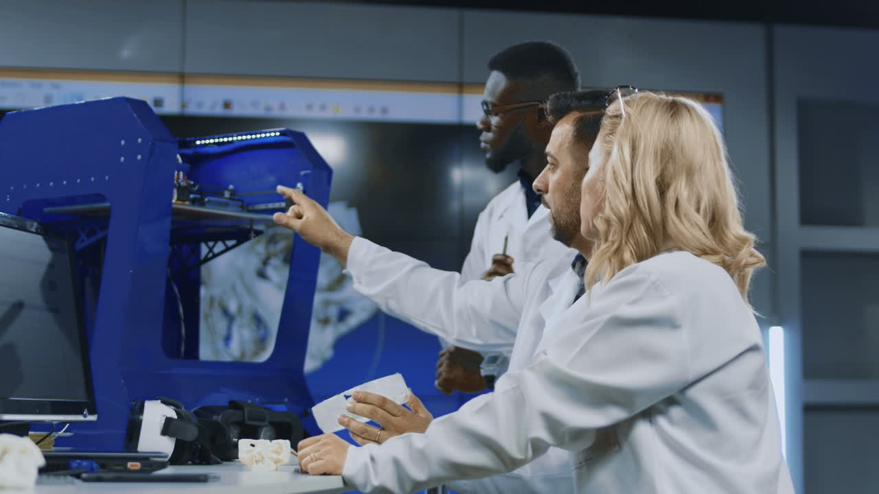 Scientists Inspecting 3D Printed Medical Model