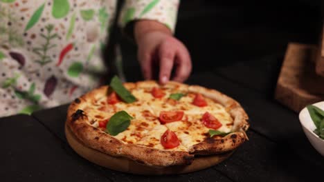 chef preparing a delicious pizza