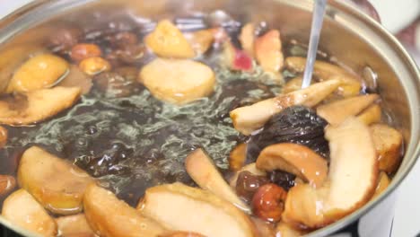 closeup of preparation of dried fruit compote 4k 2025 08 04 22 01 16 utc.mov | arabian, arabic, asian, backdrop
