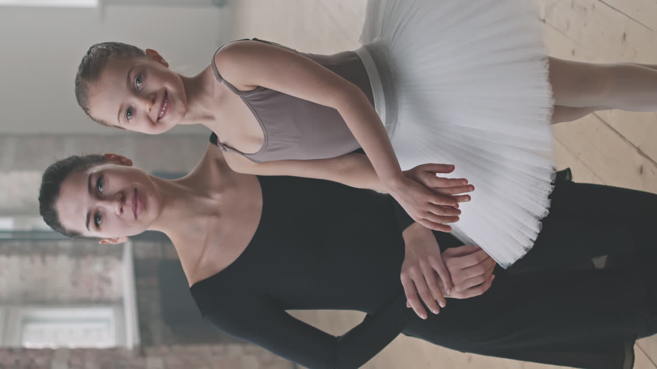 Portrait Of Ballet Teacher With Little Girl In Class