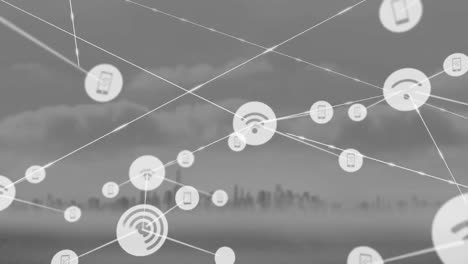 animación de una red de iconos digitales frente a una vista aérea del paisaje urbano