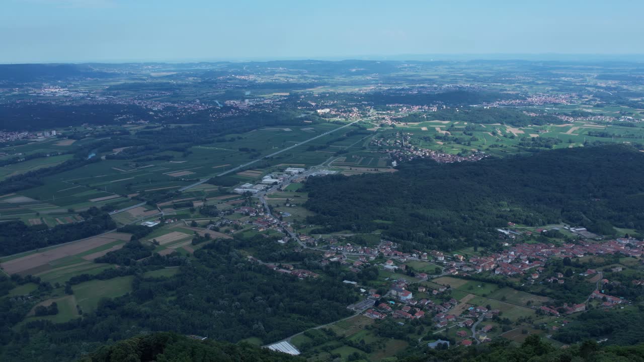 Anfiteatro Morenico from Val Chiusella—showing forested moraines, glacial lakes, and alpine ridges that frame the transition from mountain to plain in northern Italy