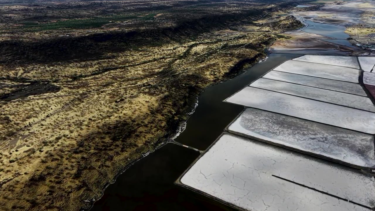 Lake Magadi kenya Sodaash Alkaline water salt lake Trona mineral deposits rift valley kenya . kenyan lake with Trona.