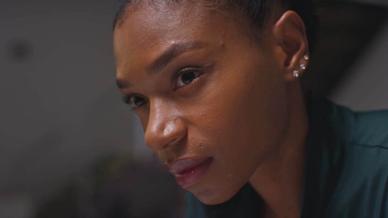 Close Up Portrait Of Determined Female Athlete Sport Training In Gym Sitting And Concentrating In Changing Room With Focused Expression 6