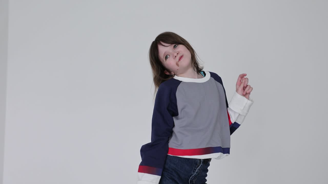 A young girl in a studio shot