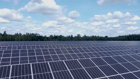 Solar-panel-field-close-up-aerial-view-in-sunny-daylight