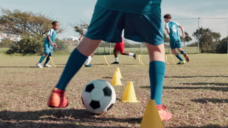 soccer training with cones and players on the field